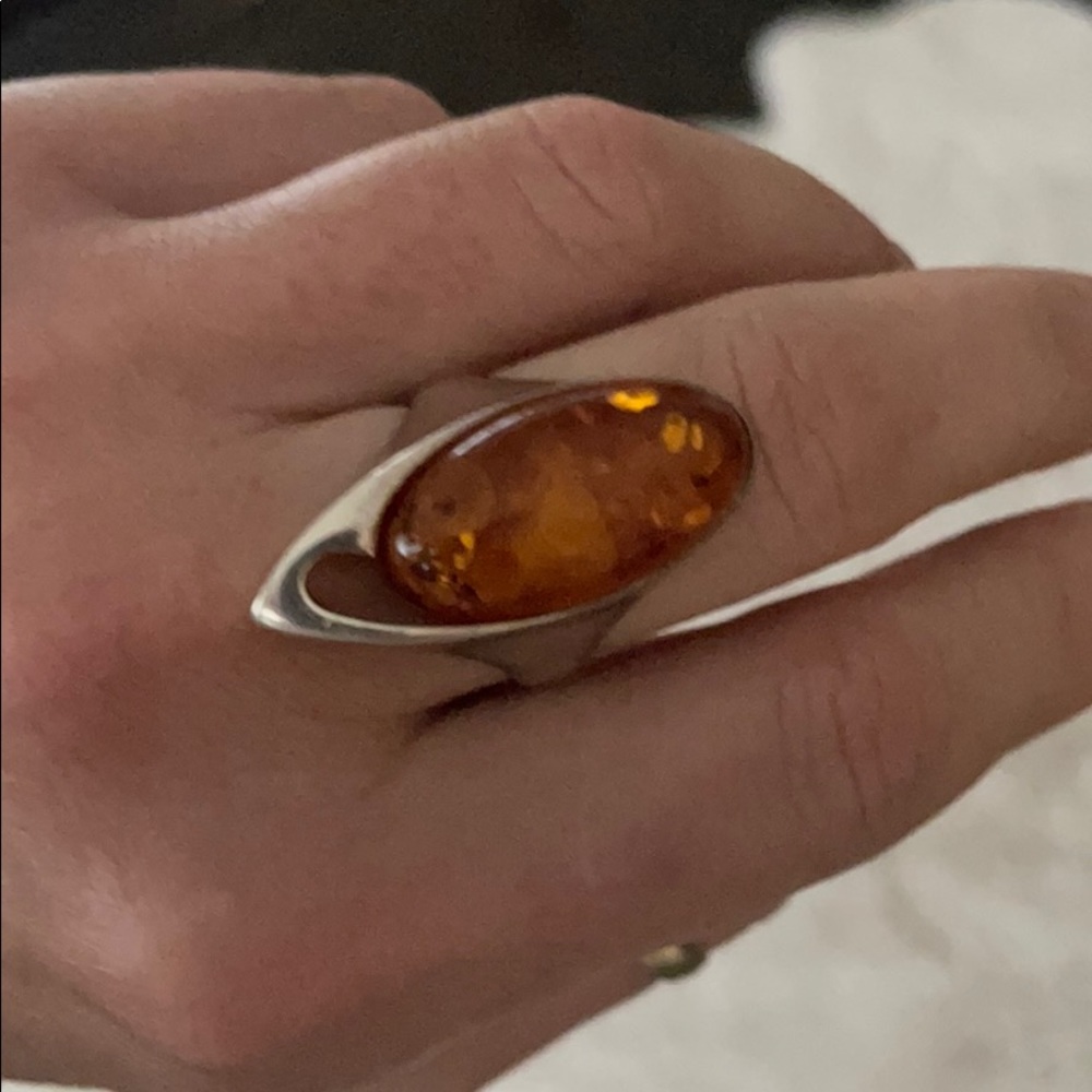 Stealing silver amber ring